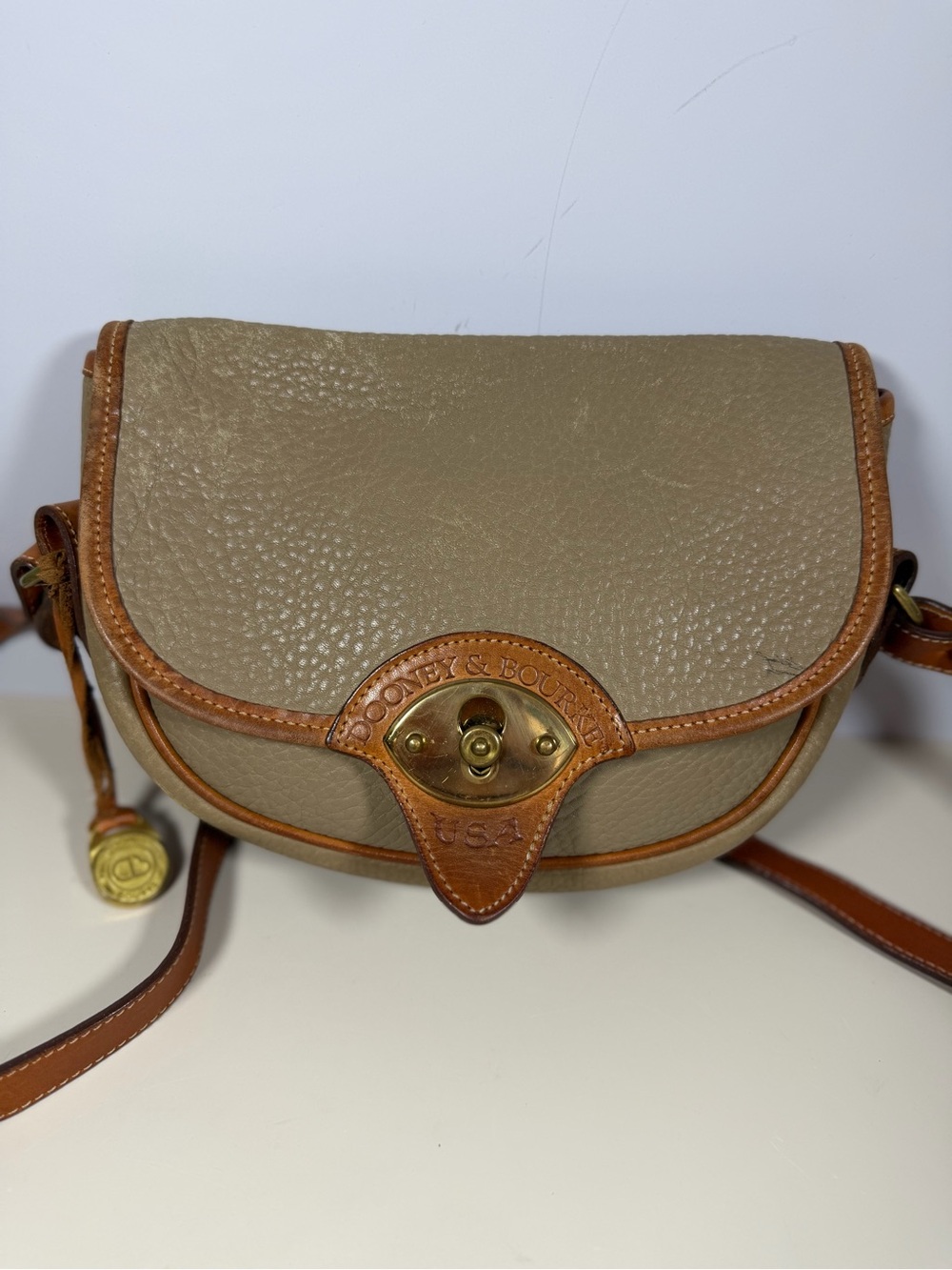 Dooney & Bourke Taupe Crossbody with Brown Trim and Gold Hardware